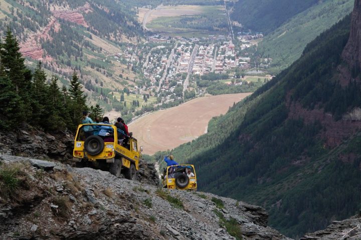 a train is coming down the mountain