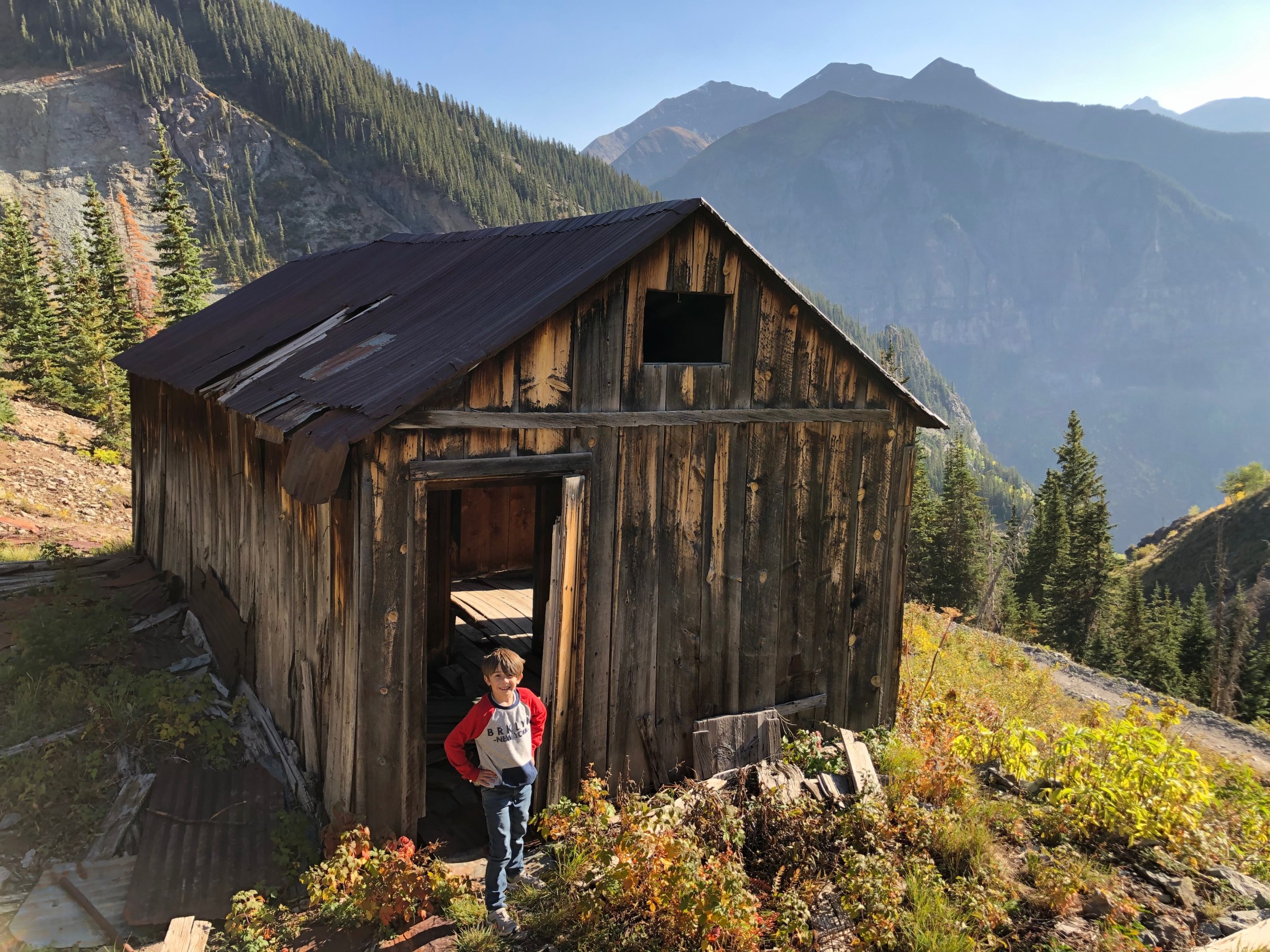 a building with a mountain in the background