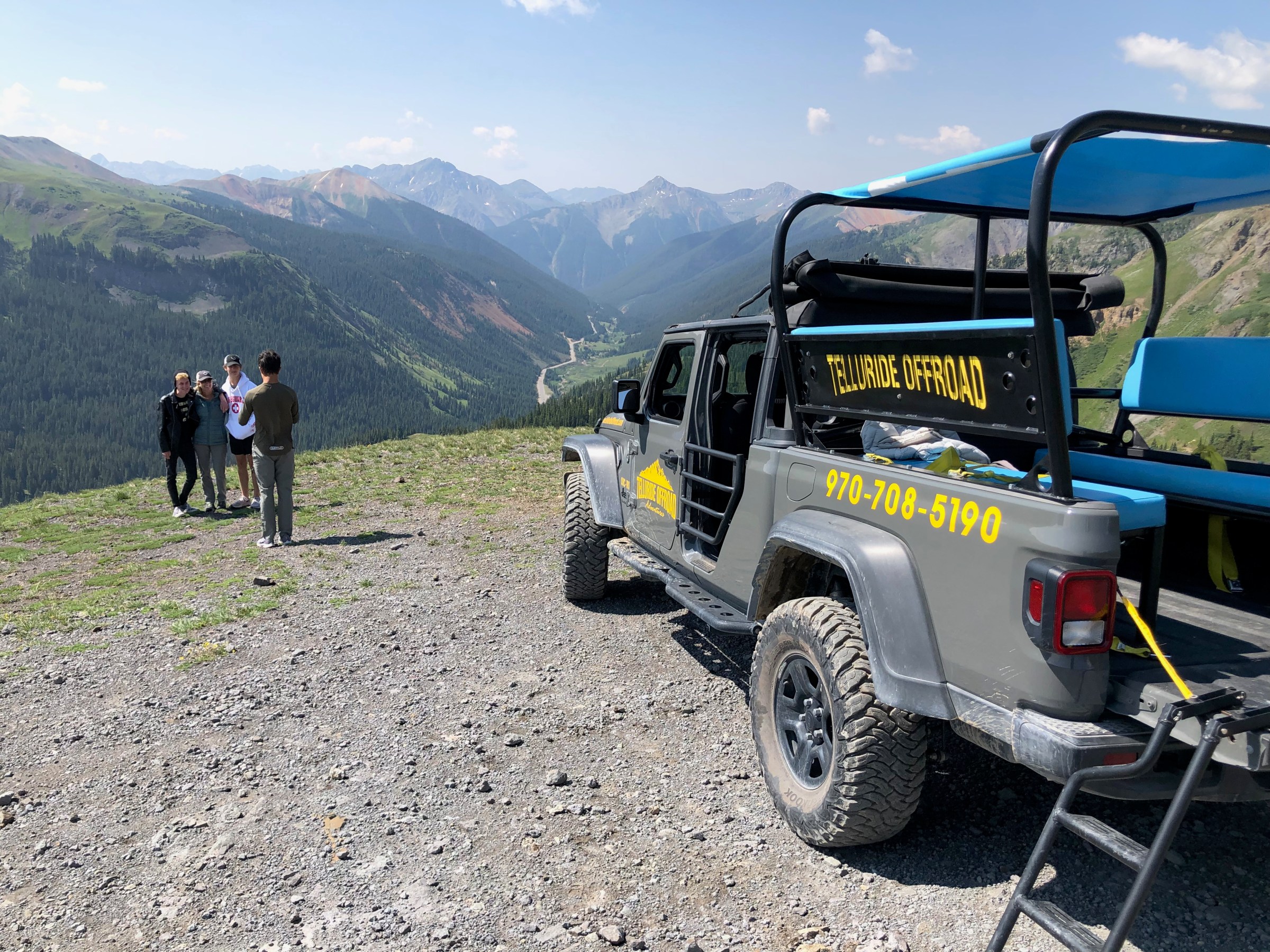 a truck with a mountain in the background