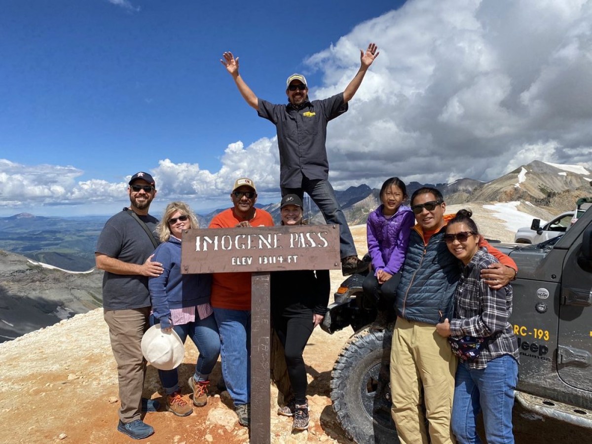 a group of people posing for the camera